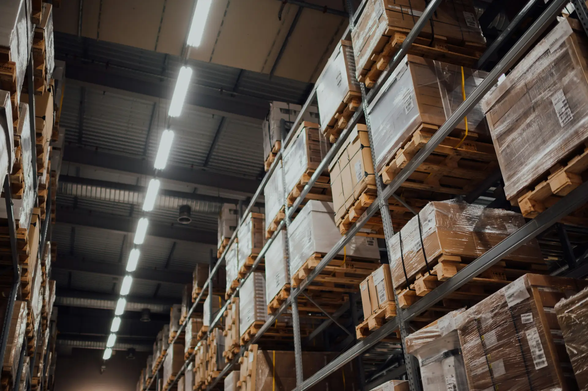 Stacked cardboard cartons on warehouse racking